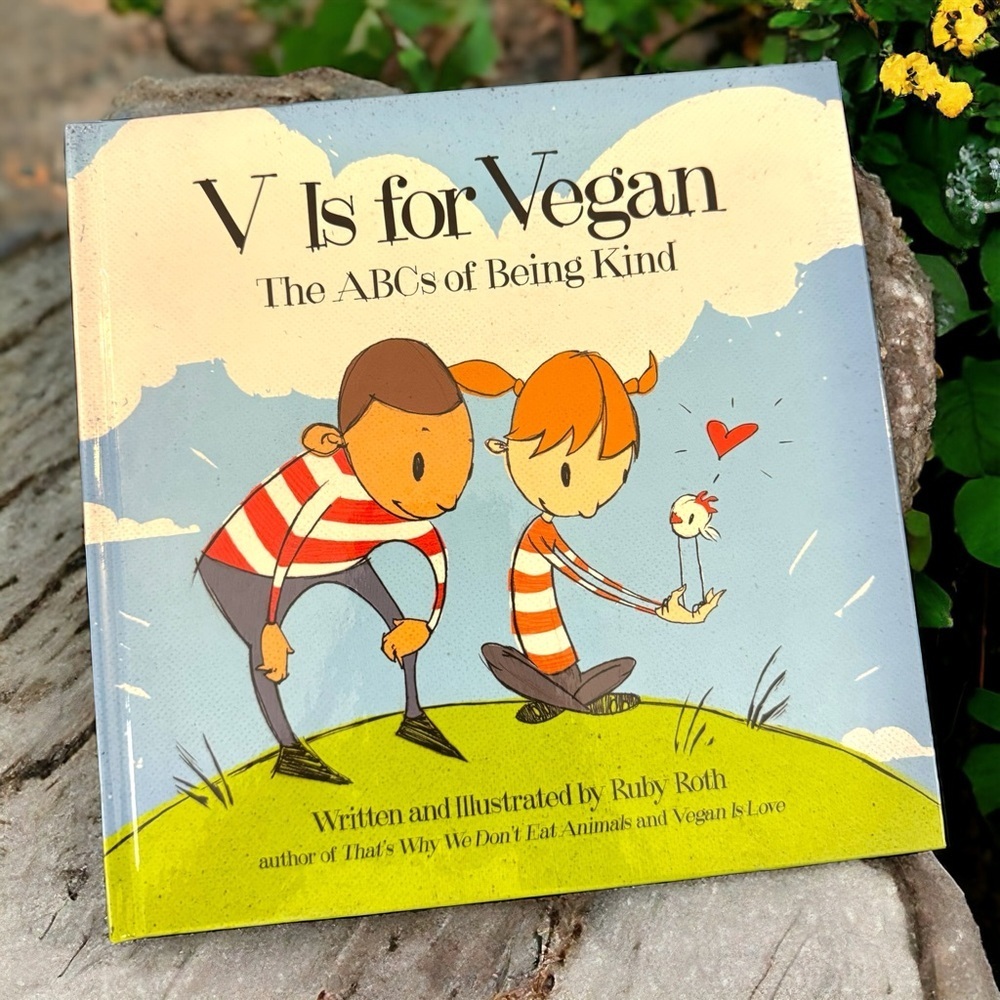 “V Is for Vegan: The ABCs of Being Kind” by Ruby Roth, Children’s Hardcover Book